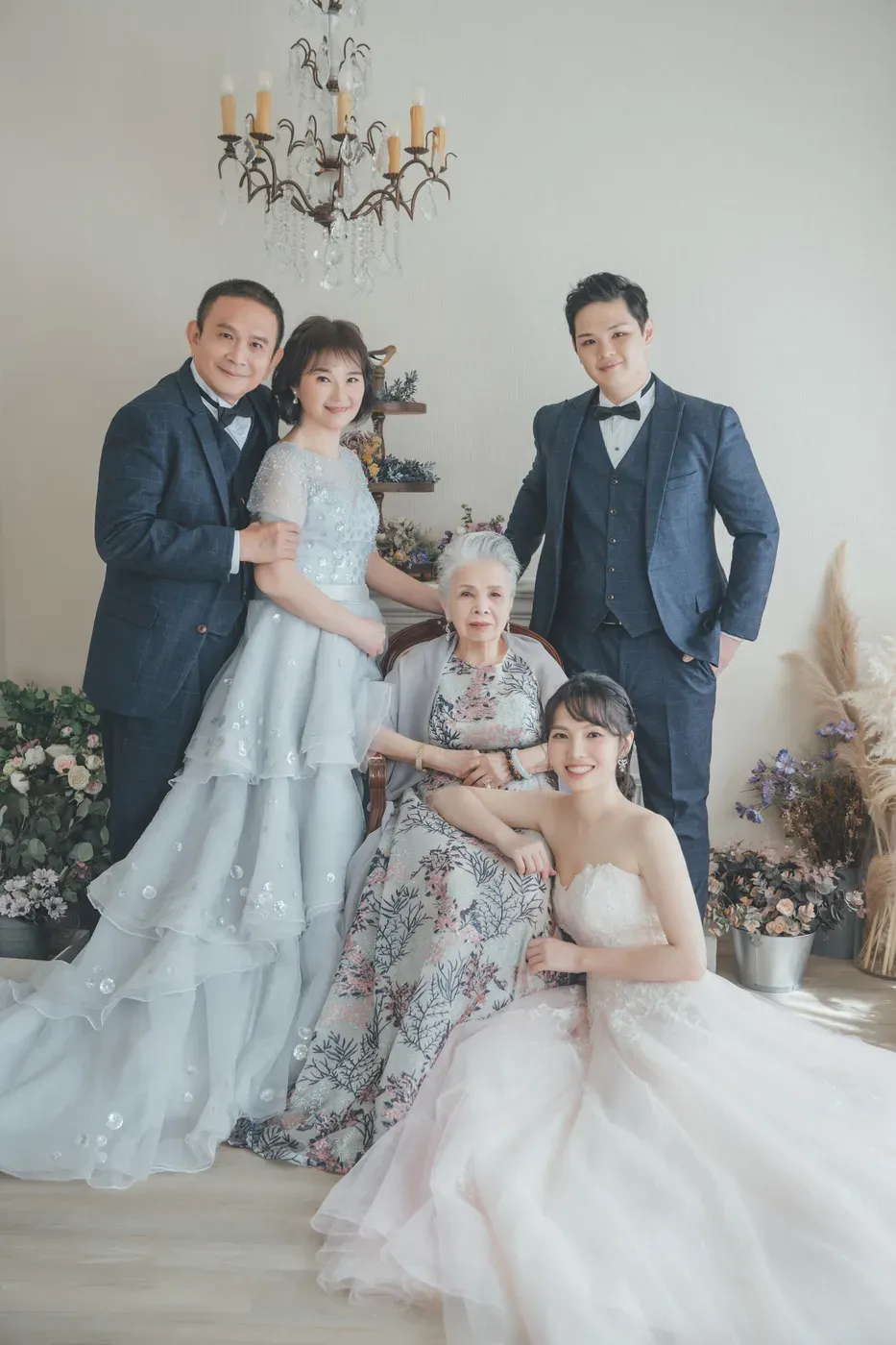 Three generation family photoshoot Singapore - grandparents, parents and children photographed together