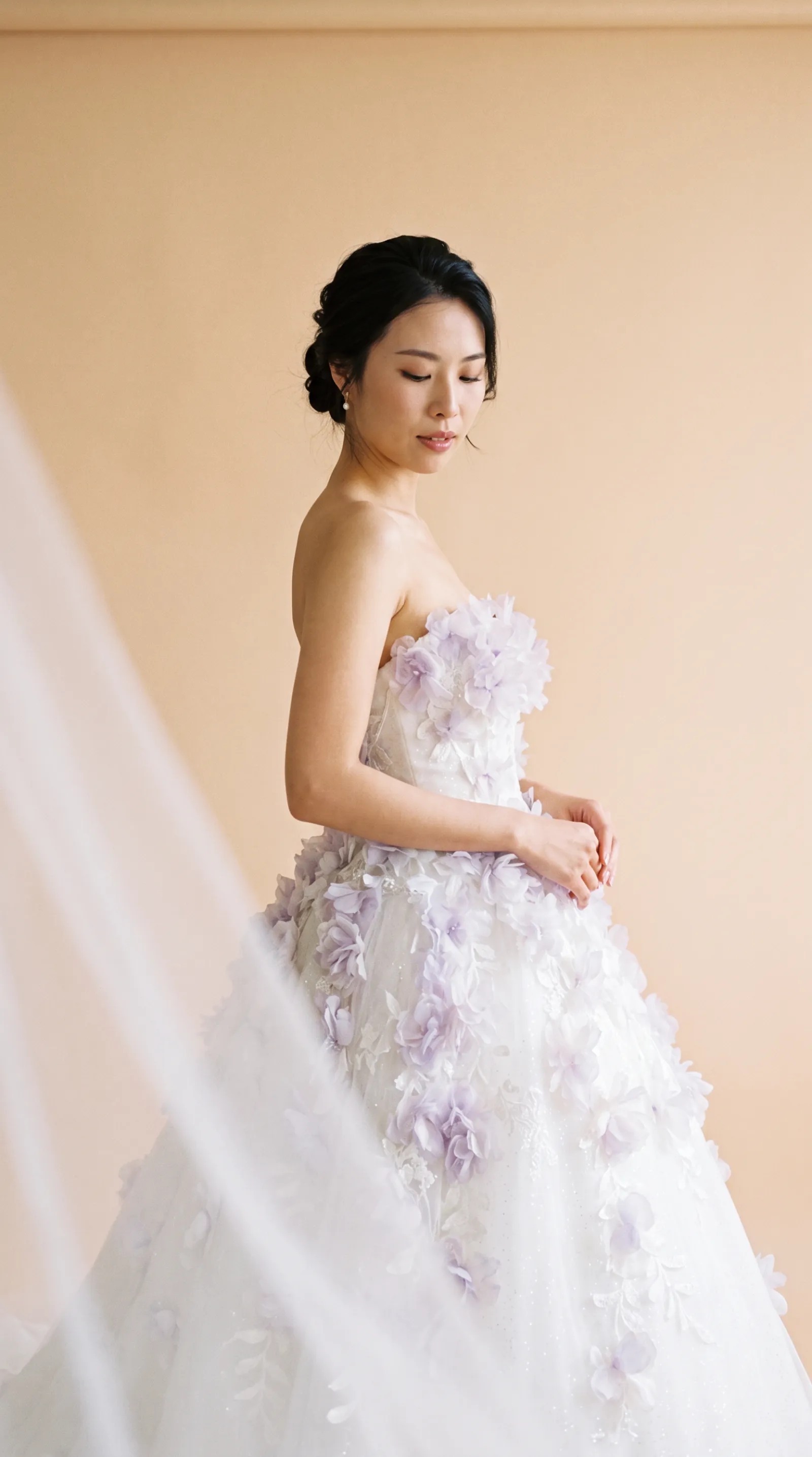 Violetta — Looking down at clasped hands