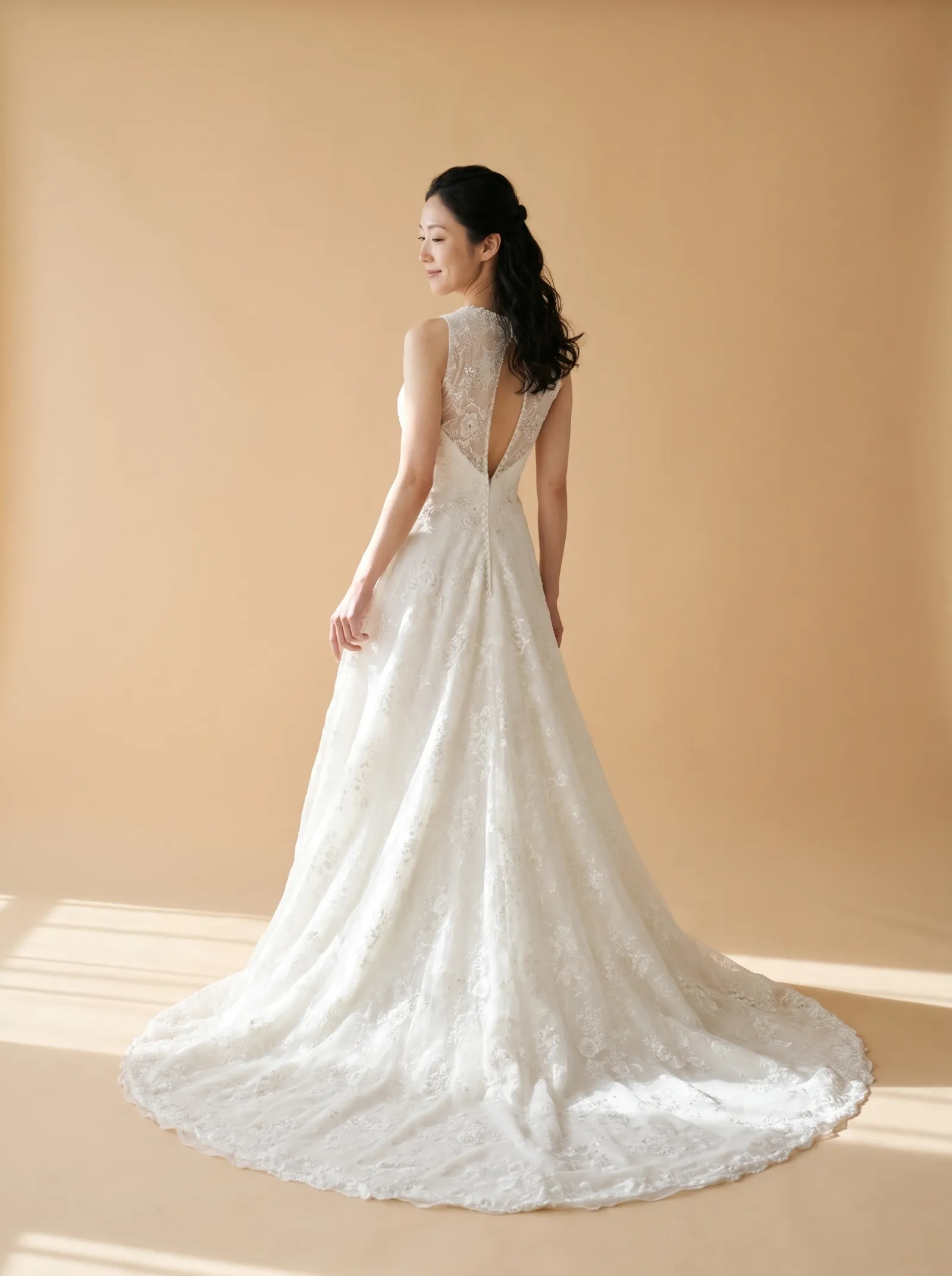 Adelaide wedding gown, back full-length, over-shoulder glance