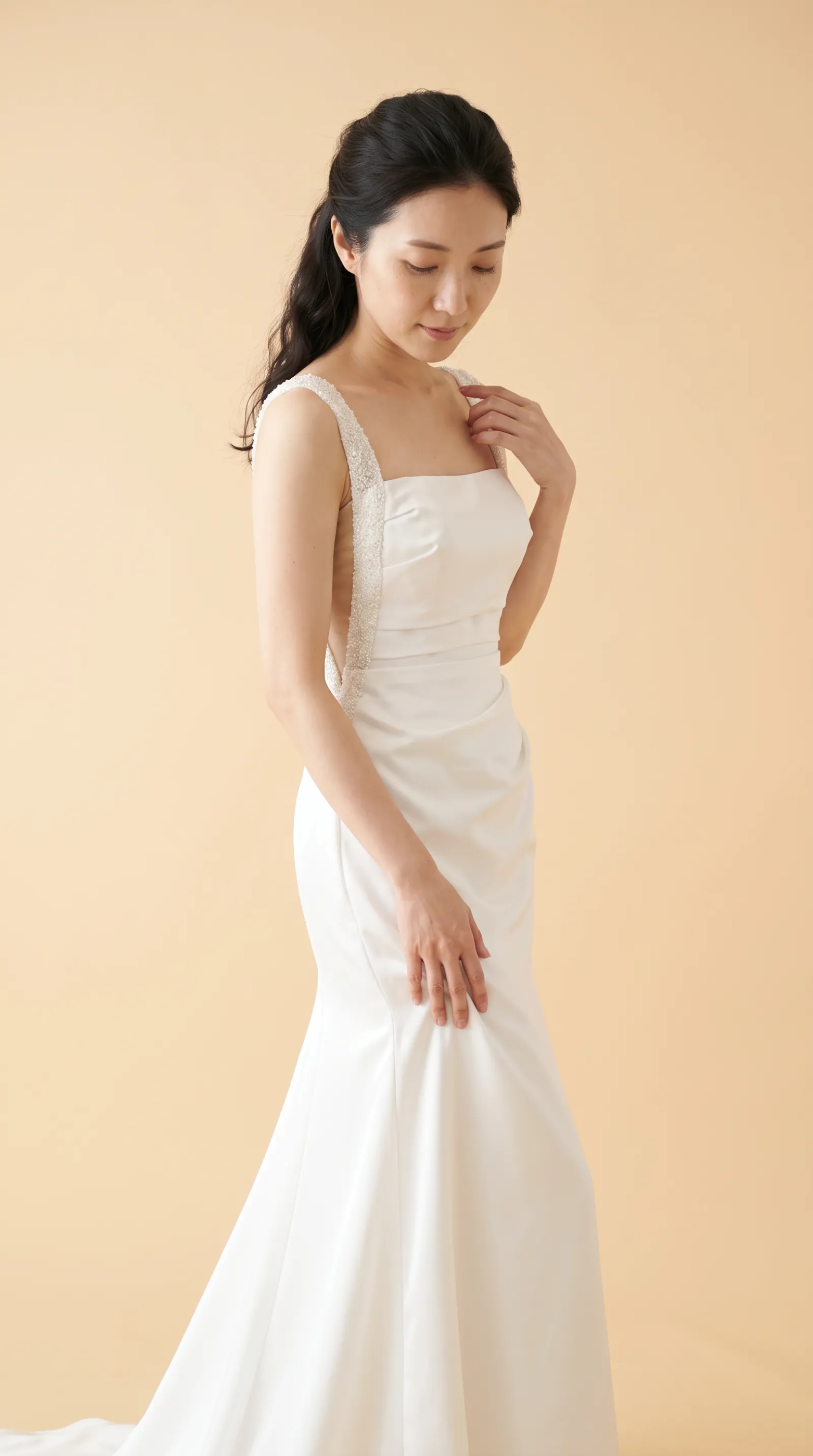 Portia — Resting hand softly on the gown