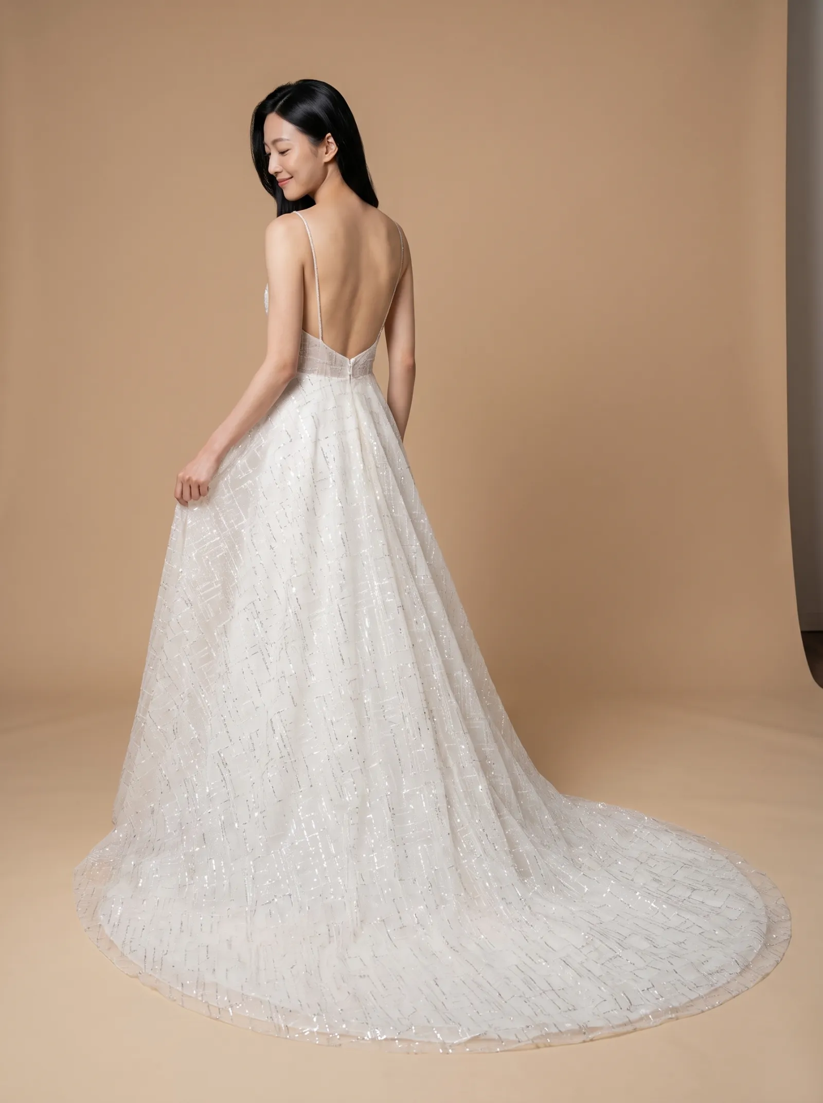 Verbena wedding gown, back - over-shoulder gaze lowered