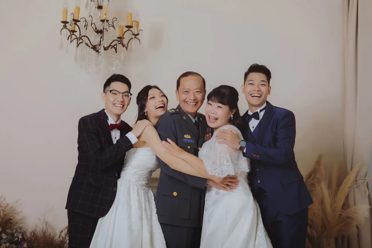 Three generation family photoshoot Singapore - grandparents, parents and children photographed together