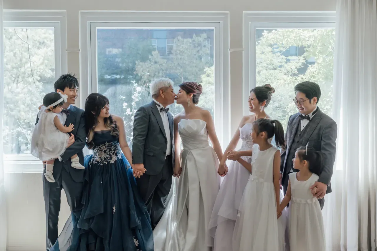 Formal family portrait in gowns and suits - family photo studio Singapore
