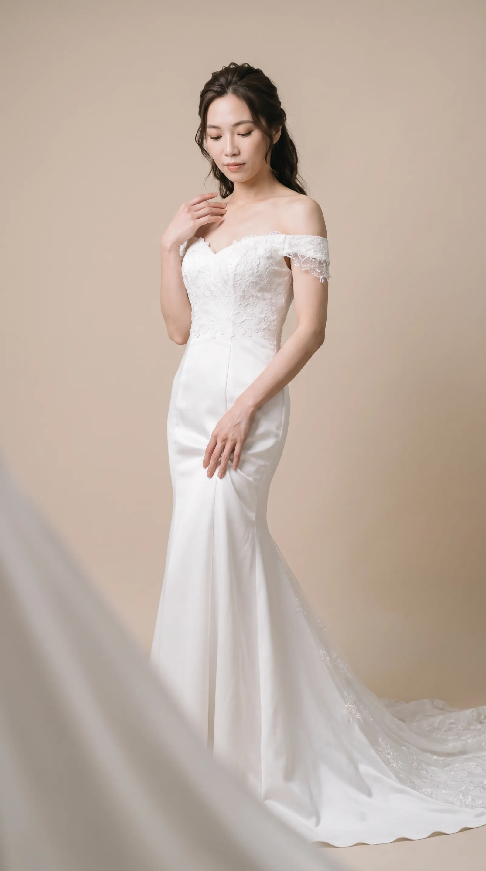 Genevieve — Resting hand softly on the gown