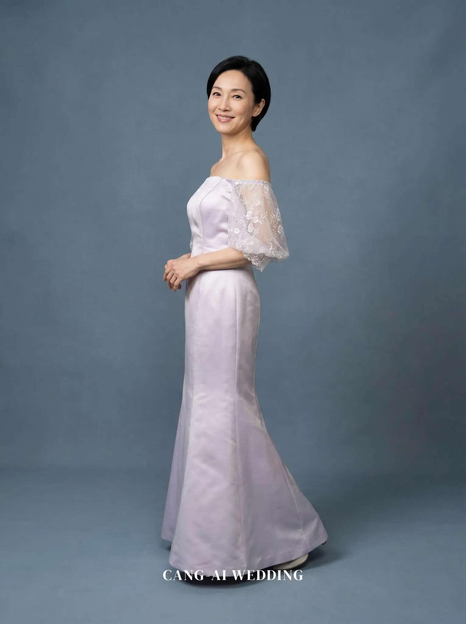 mother_gown_67 - Pausing mid-step in quiet grace