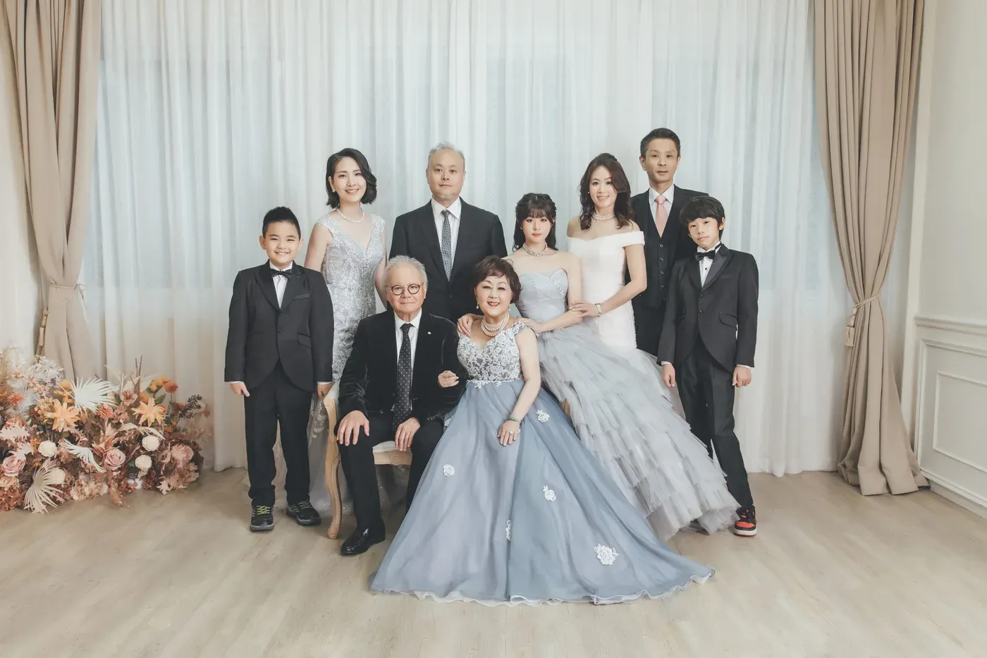 Three generation family photoshoot Singapore - grandparents, parents and children photographed together
