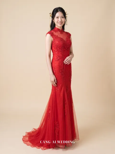 Front full-length of Hongling, a red lace mermaid kua with a mandarin collar and cap sleeves, reference 15-NR82.