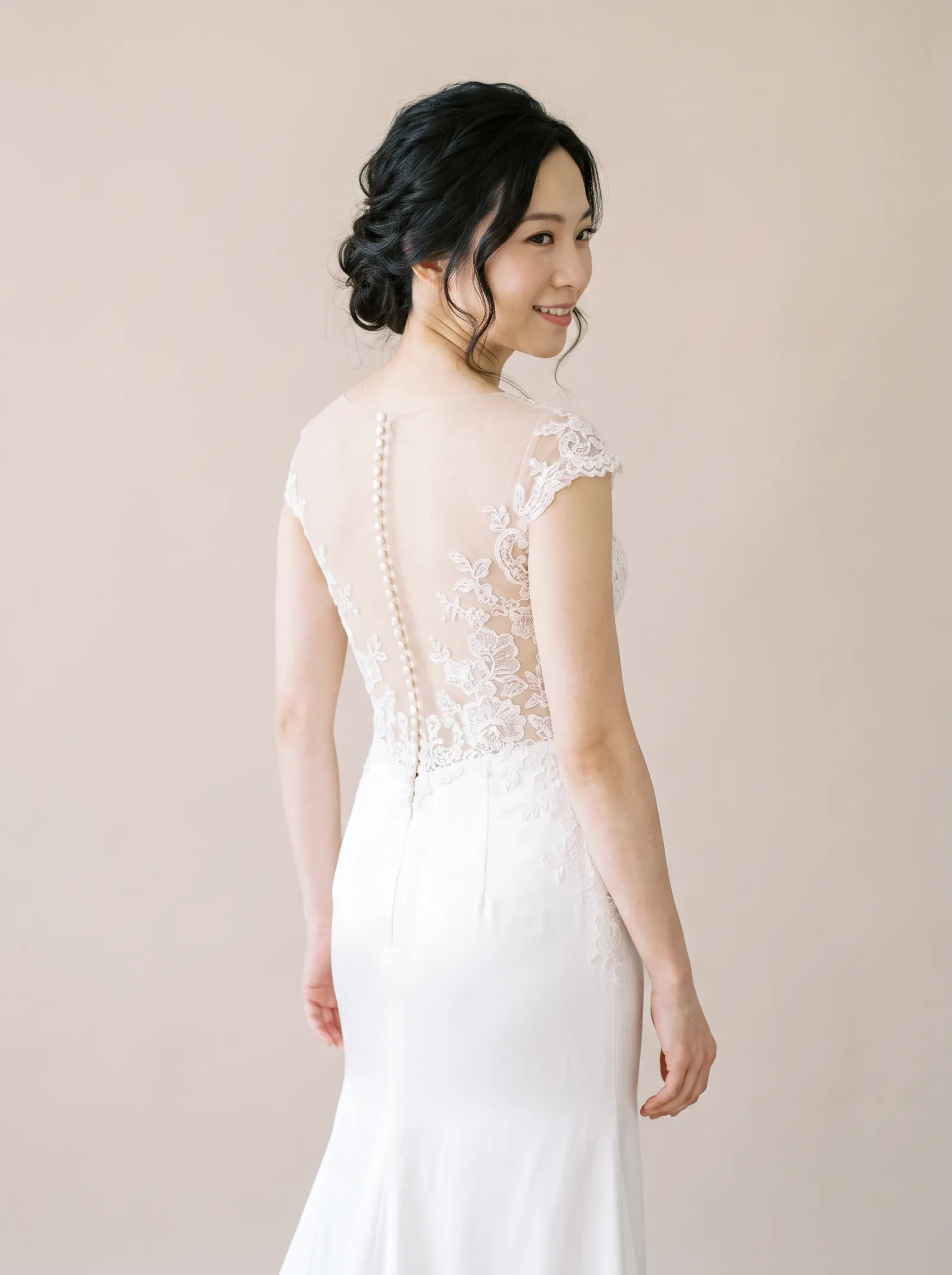 Bryony — Standard Catalog · Three-quarter close - back, glancing over the shoulder