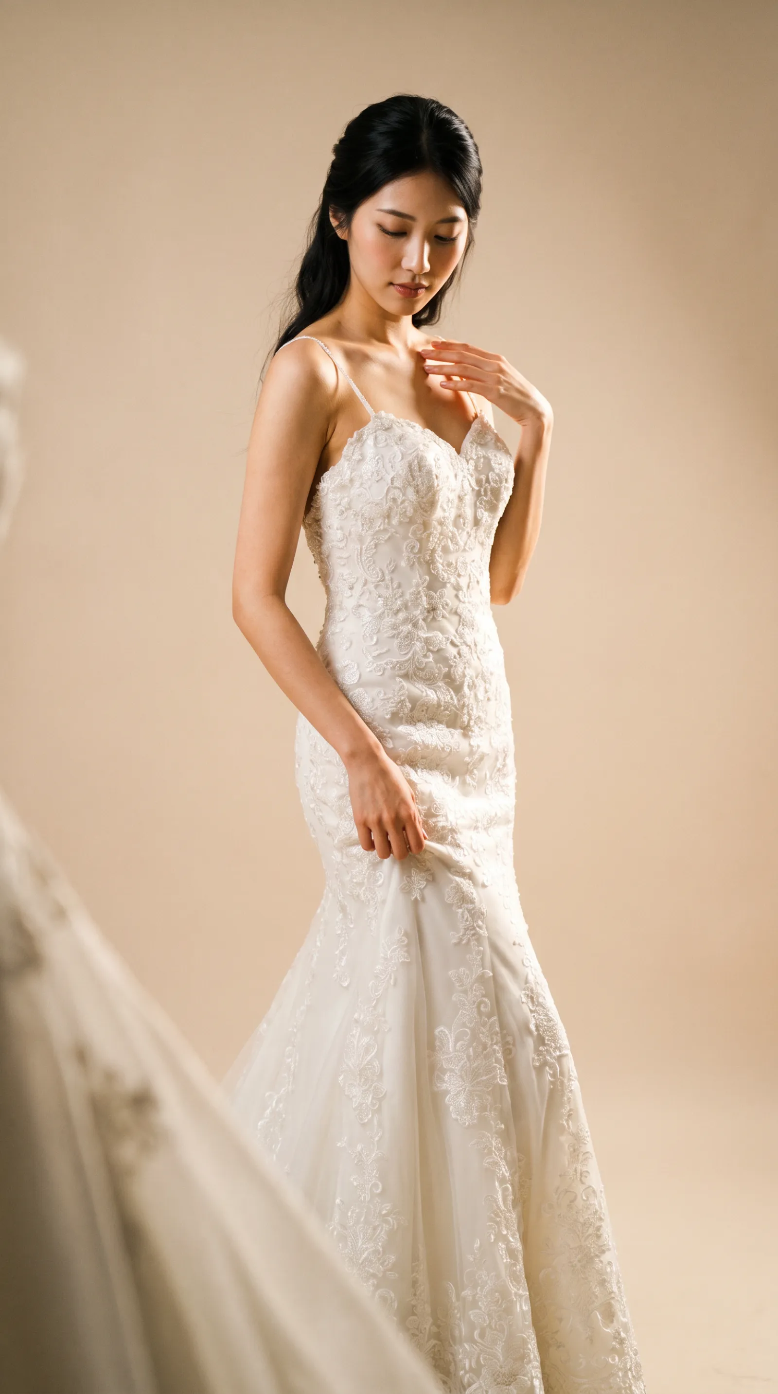 Cleo — Resting hand softly on the gown