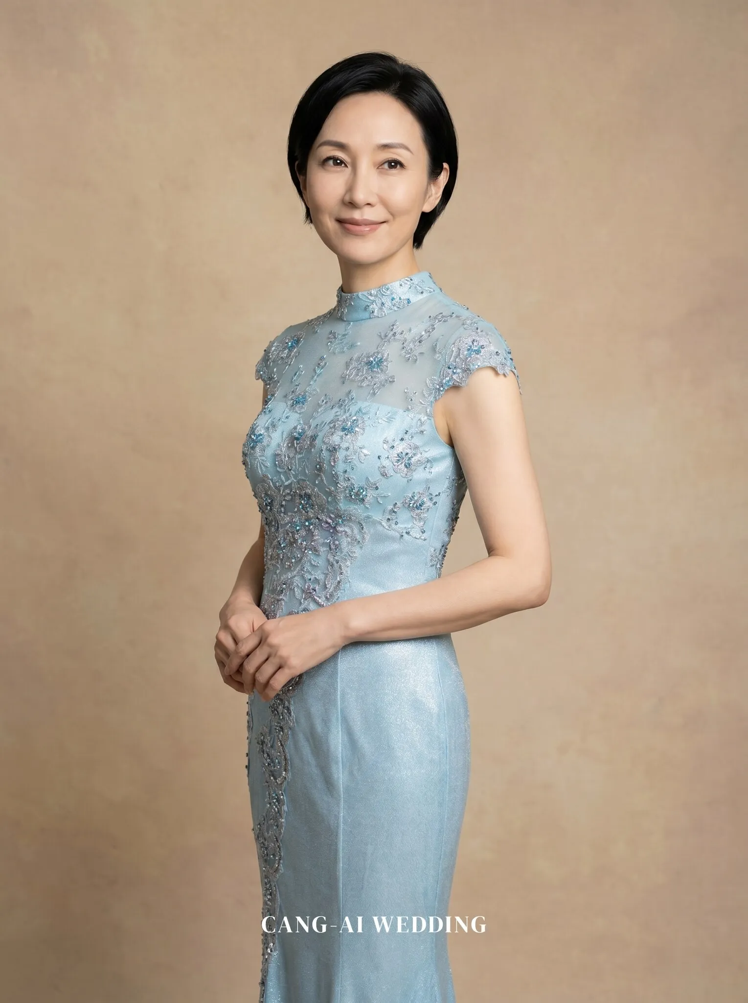 mother_gown_70 - F5 - Gathering composure with clasped hands