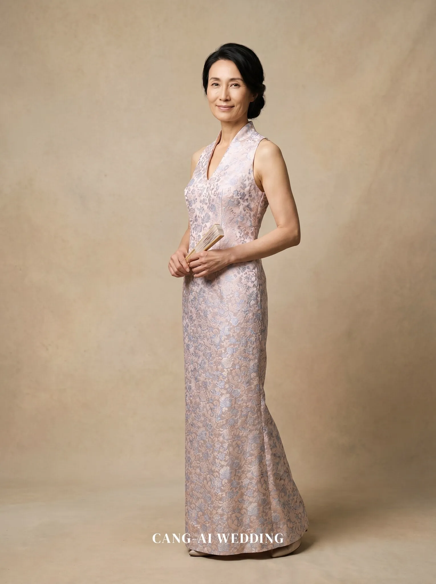 mother_gown_86 - Pausing elegantly with a closed fan