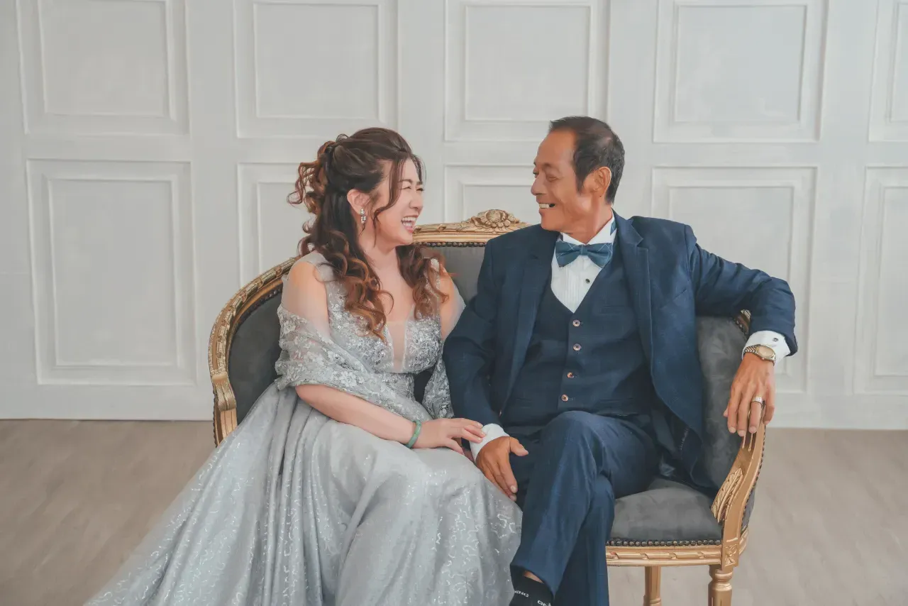 Formal family portrait in gowns and suits - family photo studio Singapore