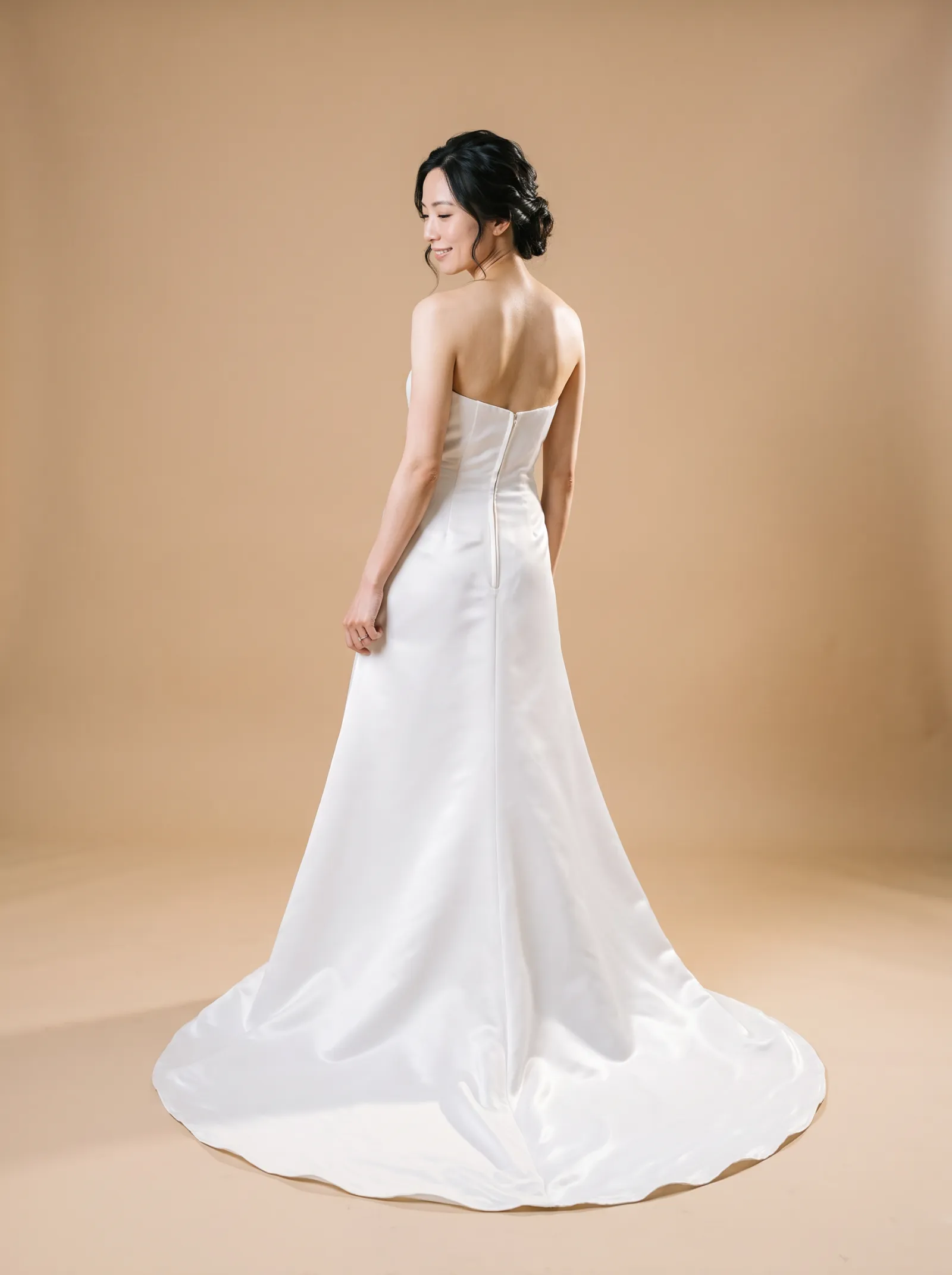 Sloane wedding gown, back full-length, over-shoulder glance
