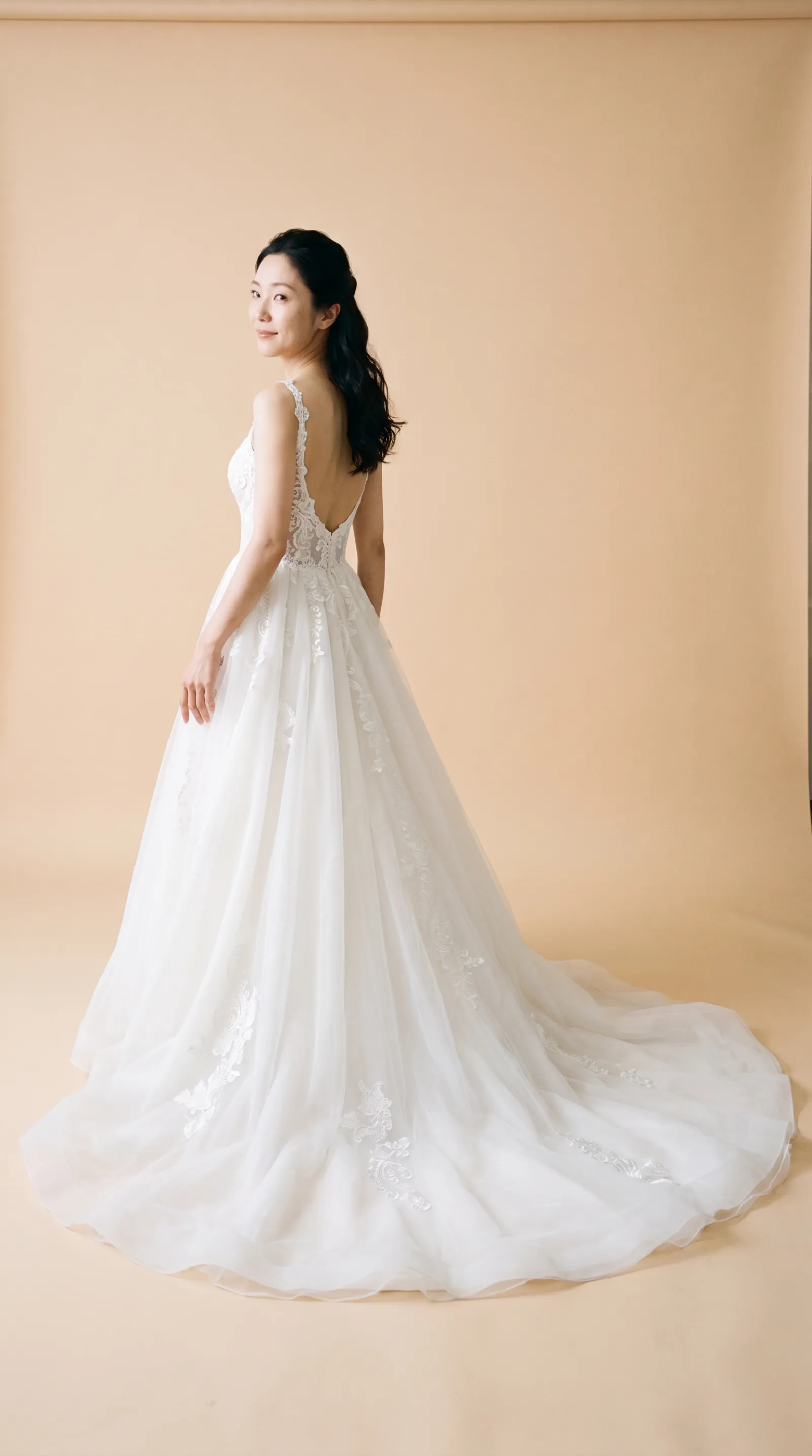 Juniper — Standard Catalog · Back full-length, over-shoulder glance