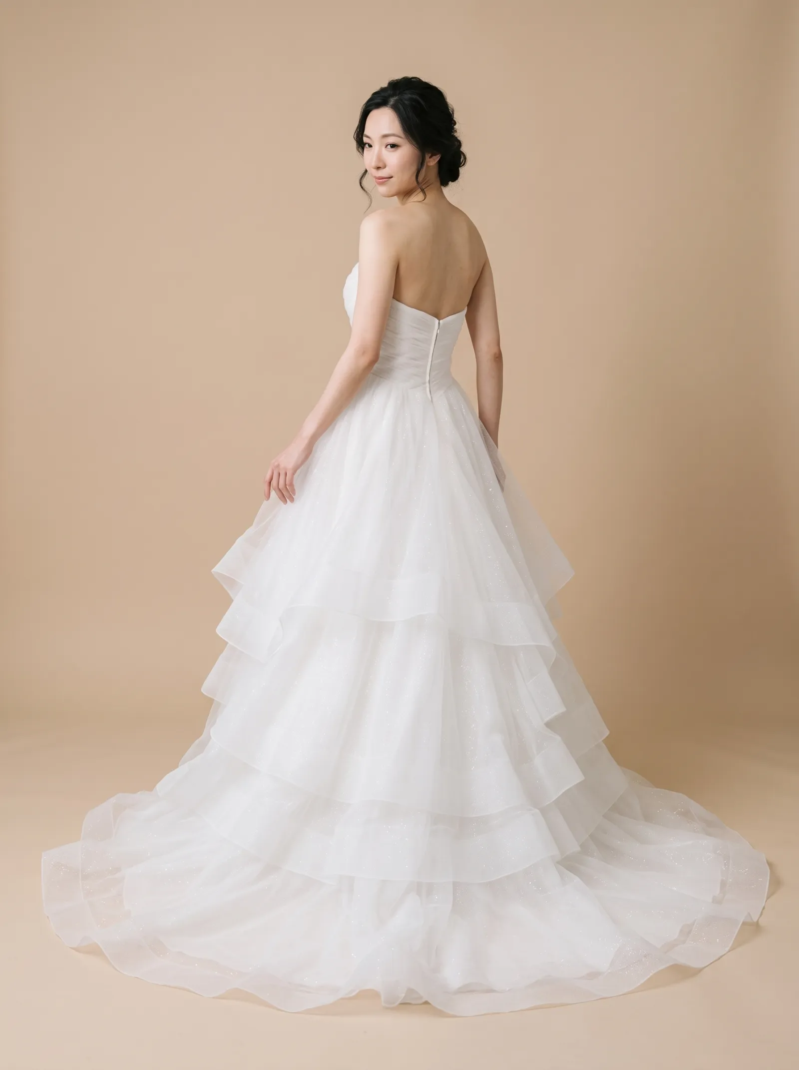 Stella wedding gown, back full-length, over-shoulder glance