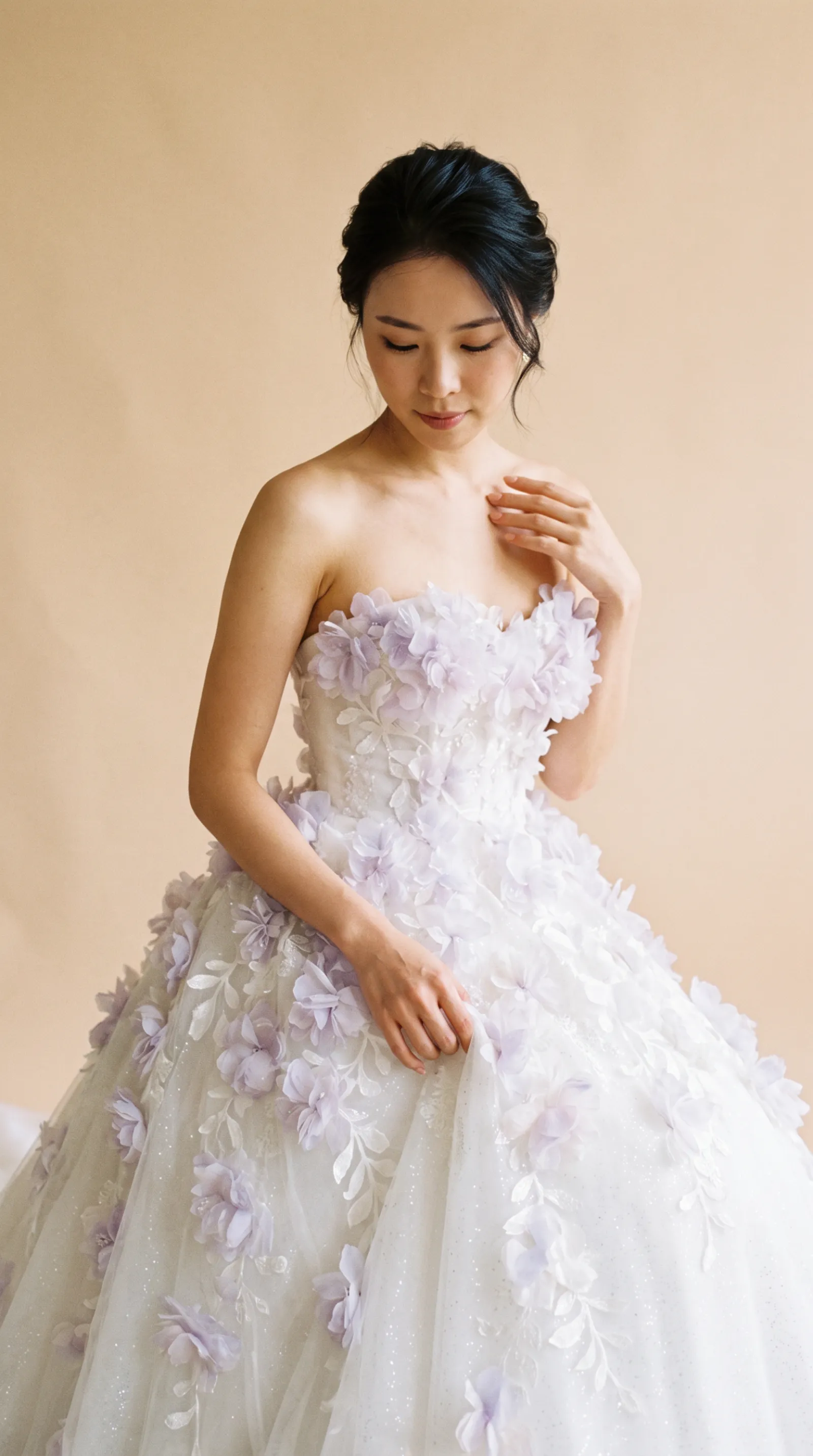 Violetta — Resting hand softly on the gown