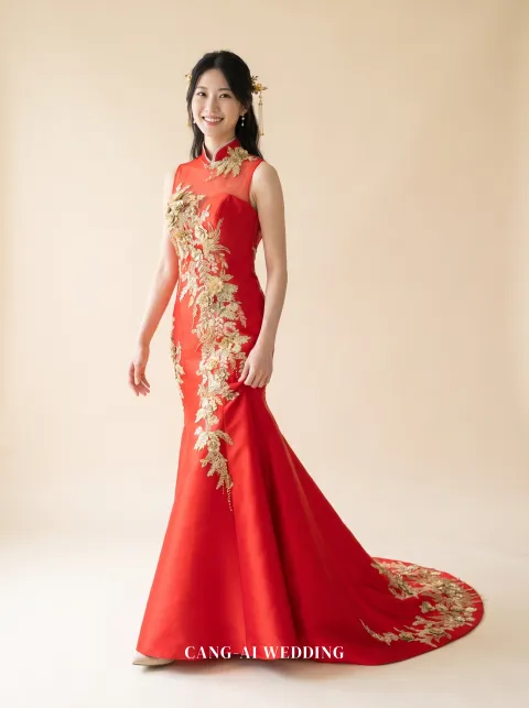 Front full-length of Fengqi, a red satin mermaid with a gold phoenix climbing one side, caught mid-step, reference 4-NR08.