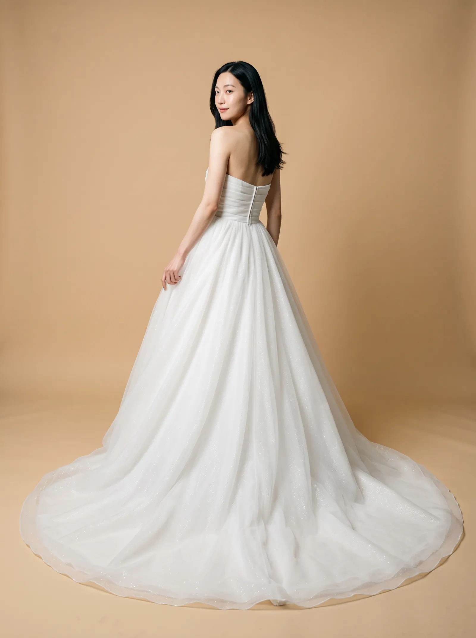 Elara wedding gown, back full-length, over-shoulder glance