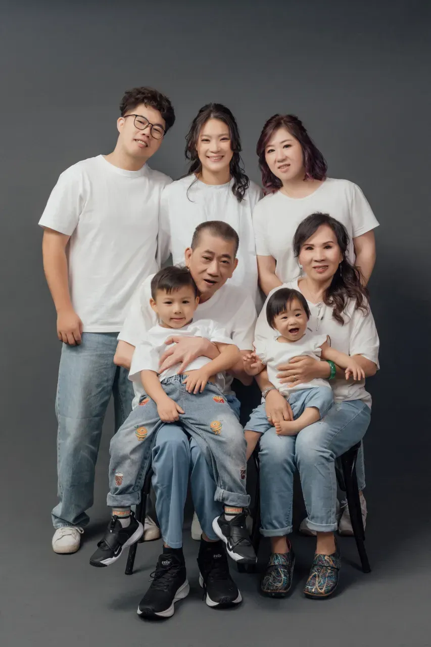 Three generation family photoshoot Singapore - grandparents, parents and children photographed together