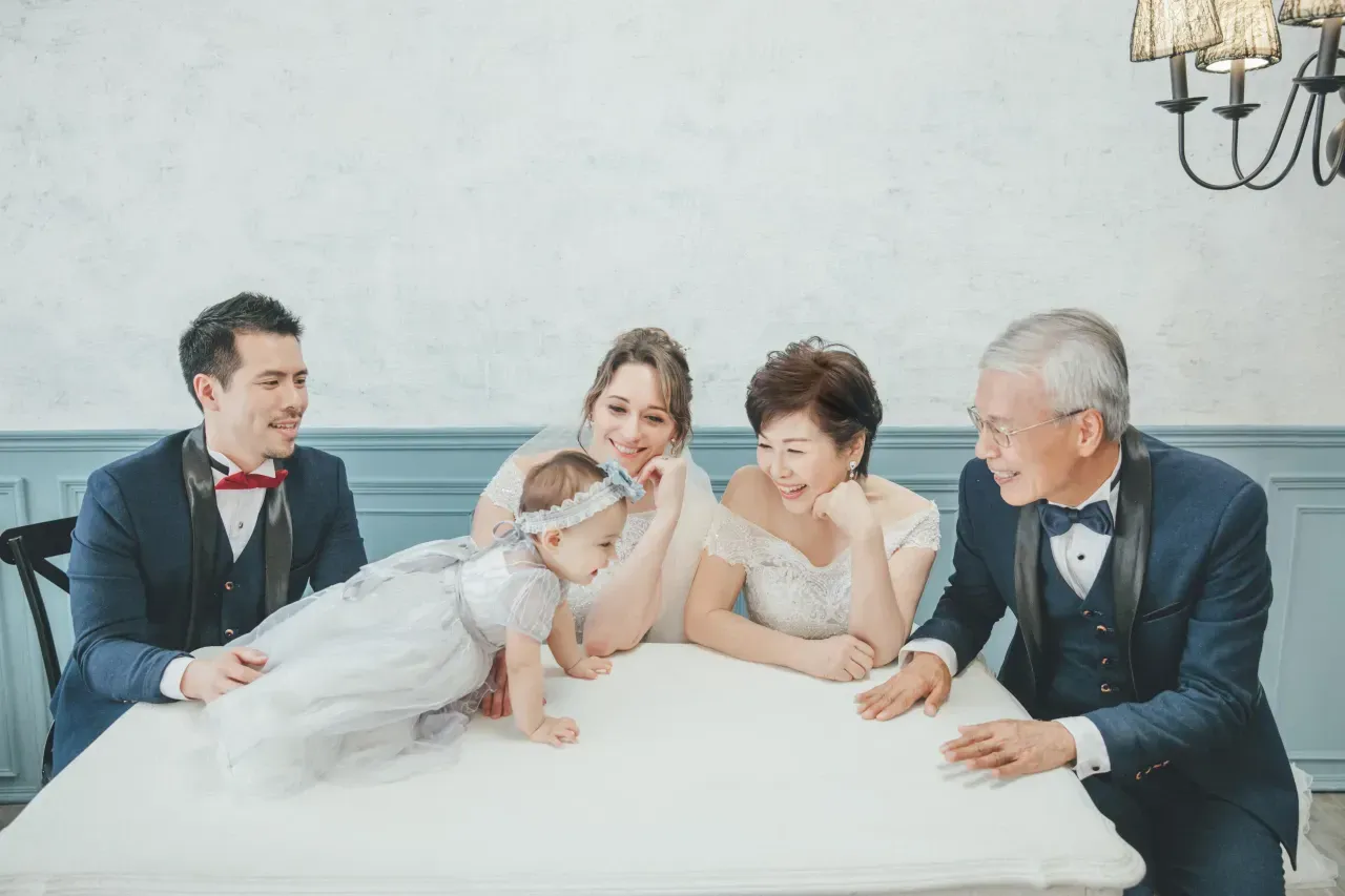 Three generation family photoshoot Singapore - grandparents, parents and children photographed together