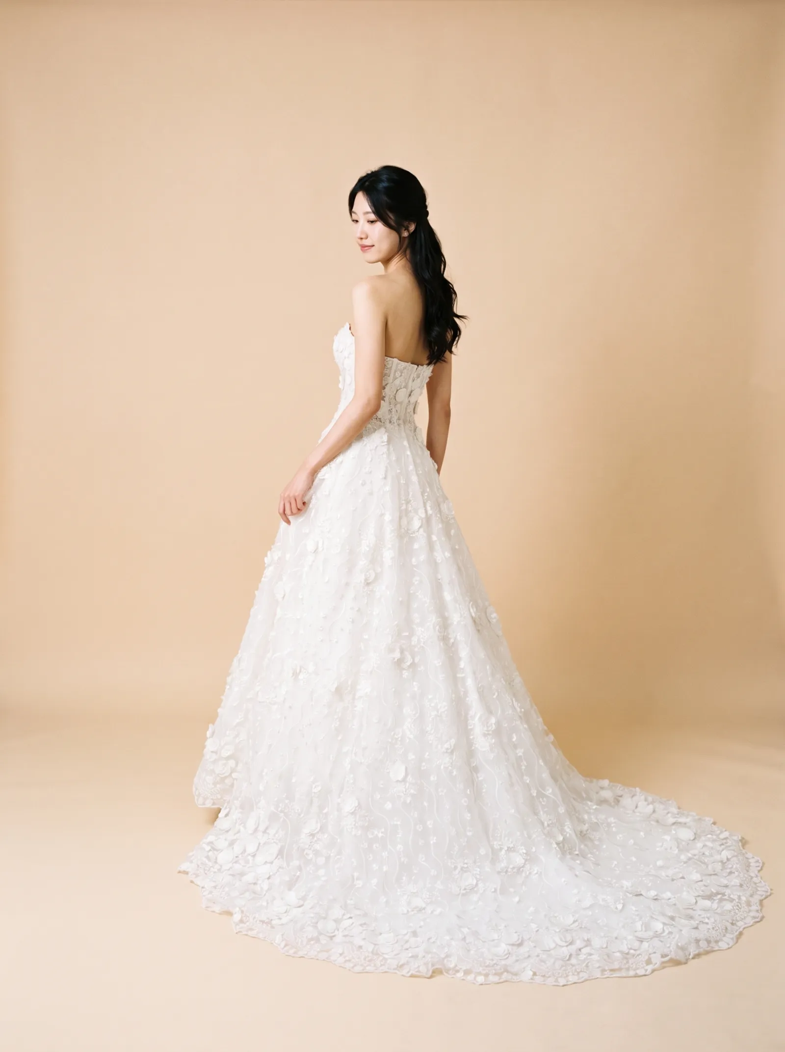 Whisper — Standard Catalog · Back full-length, over-shoulder glance
