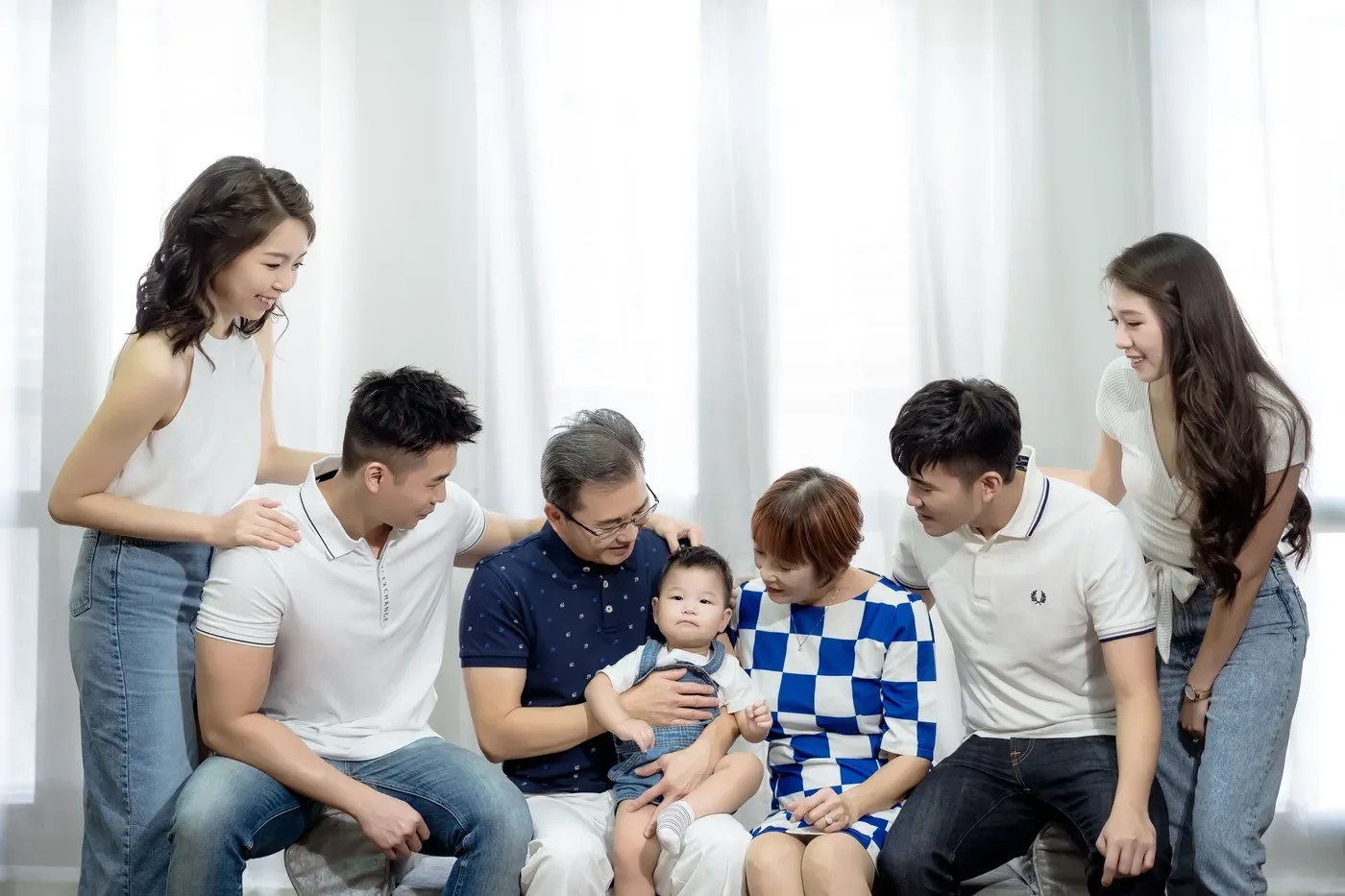 Three generation family photoshoot Singapore - grandparents, parents and children photographed together